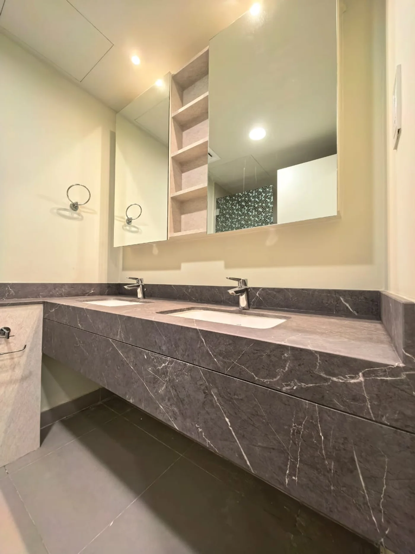 Bathroom double vanity wrapped in dark grey marble vinyl - Dubai
