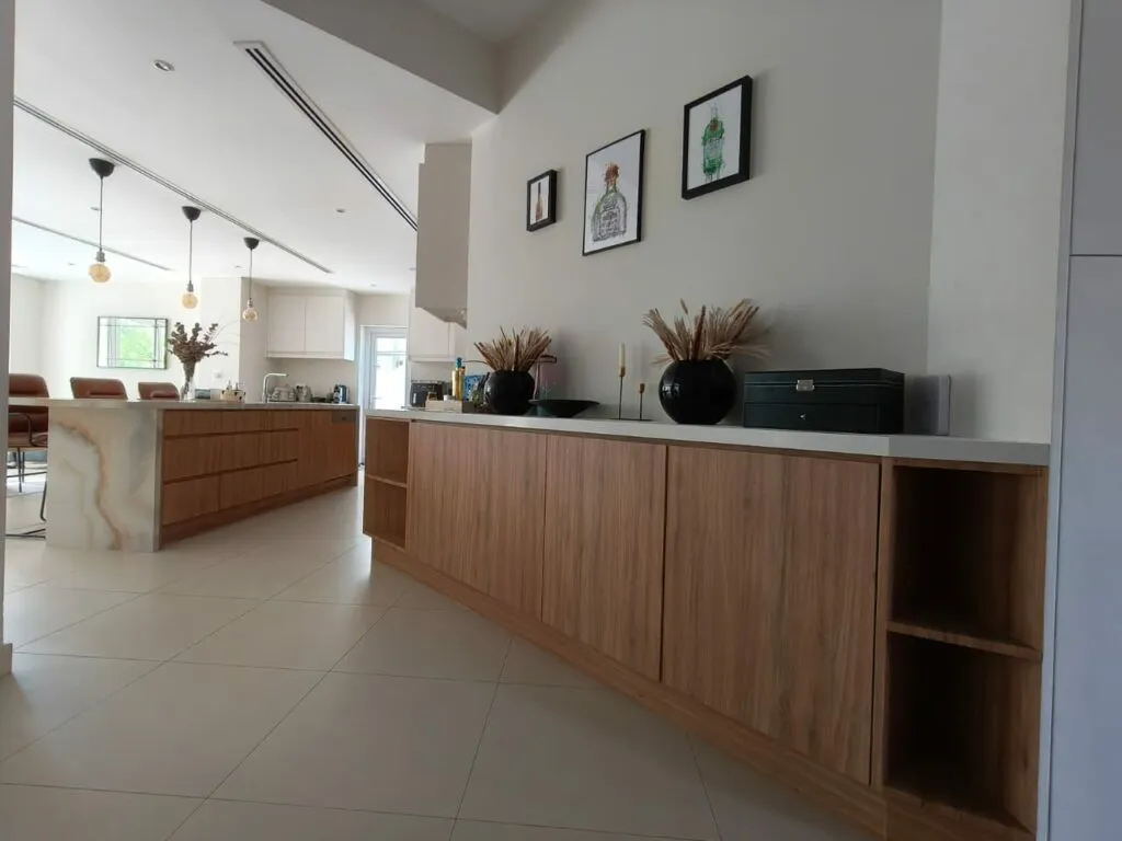 Table vinyl wrapped in wood finish Dubai