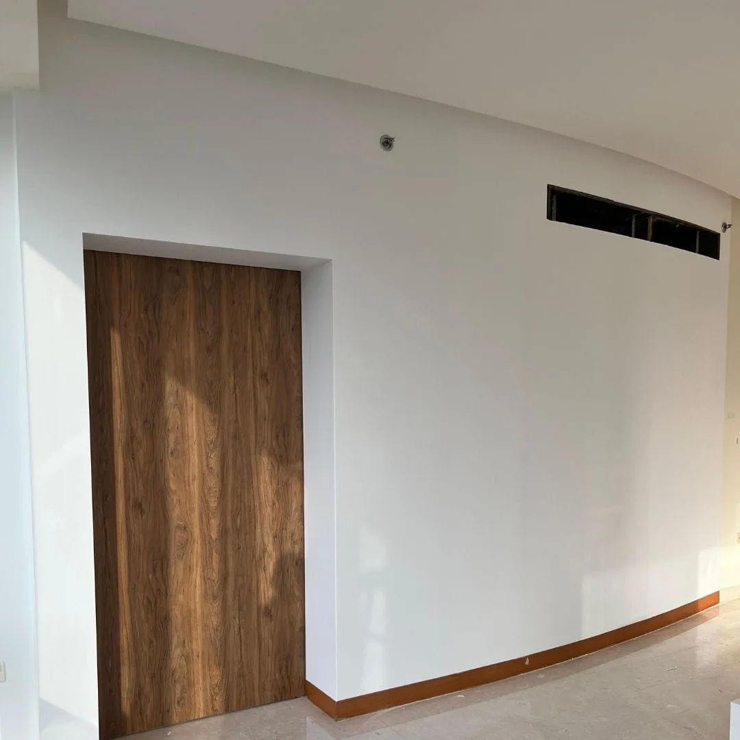 Wall and door after vinyl wrapping in Dubai